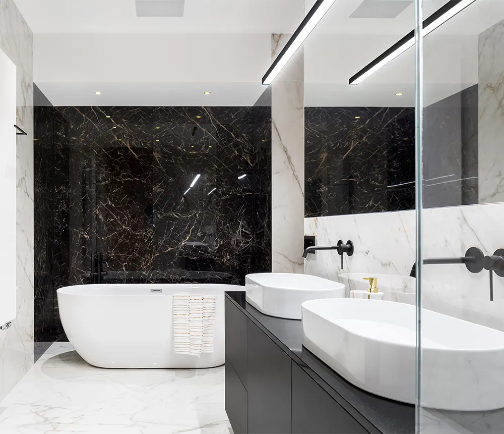 An upscale bathroom with natural stone tile