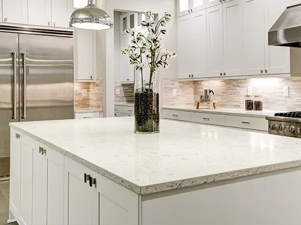 White Quartz countertop with a vase with flowers